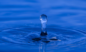 Drop of water in blue color