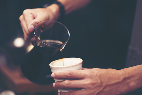 Making brewed coffee from steaming filter drip style.