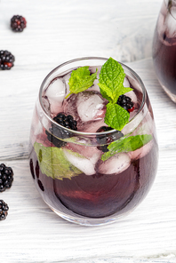 Fresh blackberry drink lime mint and ice
