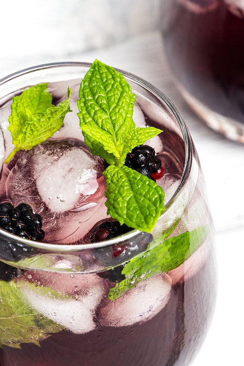 Fresh blackberry drink lime mint and ice