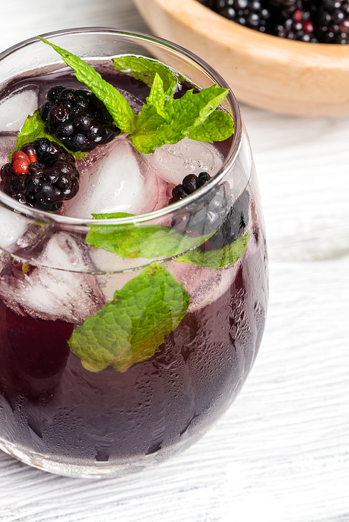 Fresh blackberry drink lime mint and ice