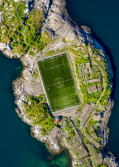 Football field stadium in Henningsvaer from above.