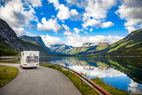 Family vacation travel RV, holiday trip in motorhome, Caravan car Vacation. Beautiful Nature Norway natural landscape.