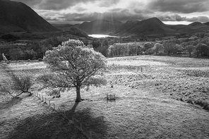 Stunning aerial drone Autumn Fall landscape image of view from Low Fell in Lake District looking towards Crummock Water and Mellbreak and Grasmoor peaks