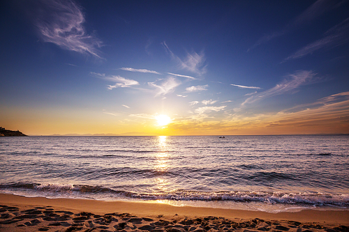 Scenic colorful sunset at the sea coast. Good for wallpaper or background image.