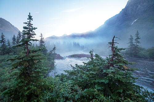 Picturesque rocky peaks of the Glacier National Park, Montana, USA. Beautiful natural landscapes.