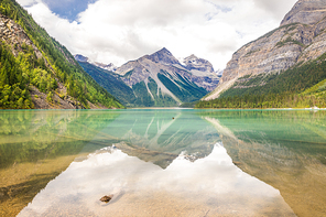 View of mountains reflecting in Kinney Lake at Mount Robson, Canada