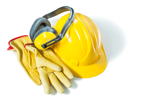 earphones helmet and construction gloves isolated on white