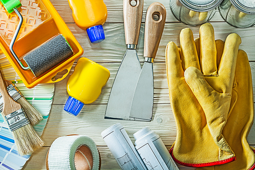 maintenanse home construction tools on white wooden board