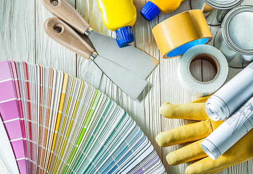 set of painting tools on white wooden background