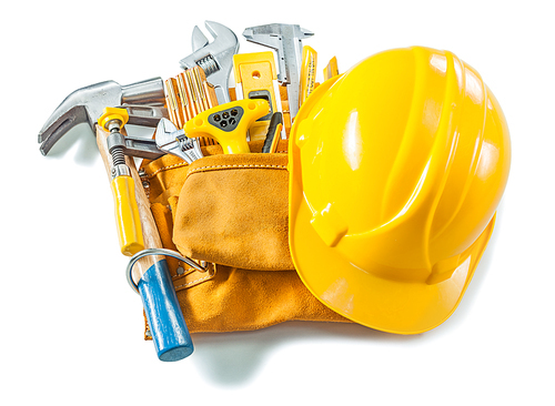 belt with construction tools and helmet isolated on white