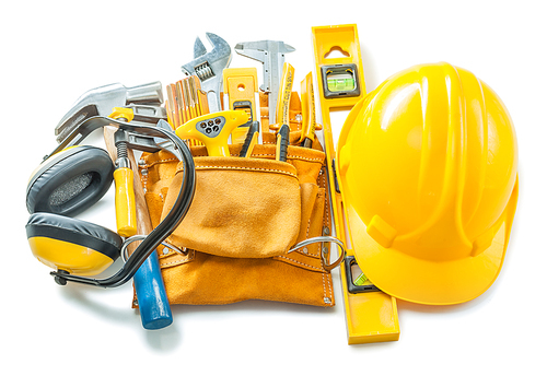 construction tools isolated on white helmet toolbelt earphones and other