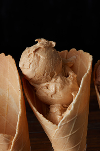 Soft ice cream in a waffle cone close up