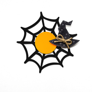 Creative halloween concept photo of witches hat made of paper on white background.