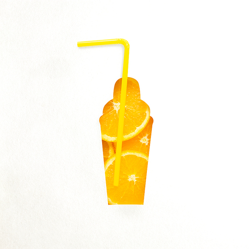 Creative concept still life food diet health photo of orange fruit juice drink beverage with straw in bottle made of paper on white background.