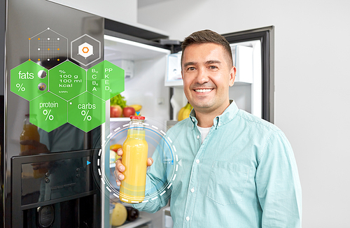 healthy eating, food and diet concept - happy smiling middle-aged man taking bottle of orange juice from fridge at home kitchen over nutritional value chart