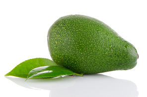 Avocado fruit with leaves isolated on white background.