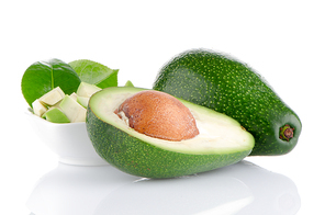 Avocado fruits on white background.