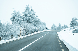 Mountain road with white snow.