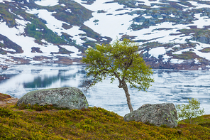 Norway hiking area, scenic mountains landscape, hills and frozen lake