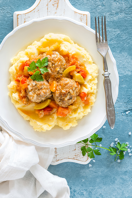 meatballs in  sauce with mashed potato, top view