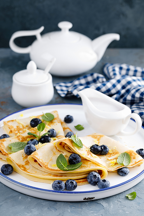 sweet crepes wrapped with fresh berries, crepes with blueberry