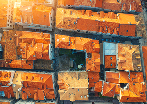 aerial view of houses with orange roofs at  in summer in dubrovnik, croatia. top view of beautiful architecture in european old city. historical centre, buildings, street in the evening. travel
