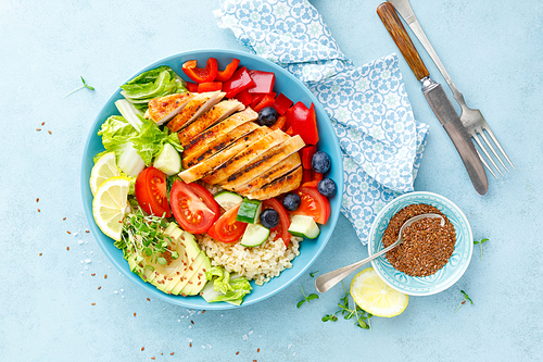 Lunch bowl with grillet chicken breast, fillet, bulgur and fresh vegetable salad
