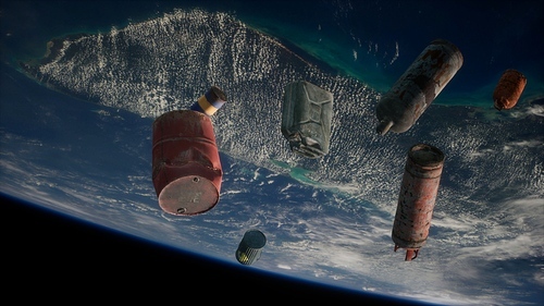 Space debris, pollution of the atmosphere of the planet Earth and space by human waste. Elements furnished by NASA