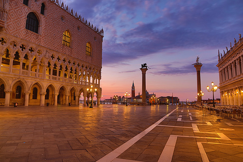 View of piazza San Marco, Doge's Palace (Palazzo Ducale) in Venice, Italy. Architecture and landmark of Venice. Sunrise cityscape of Venice.