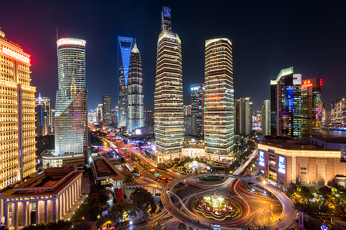 night view of illuminated Lujiazui skyline and Ring Road Circular Footbridge, Shanghai, China