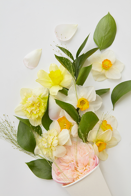 Closeup of beautiful bouquet of different flowers represented in pot isolated on white. Wedding or Valentine's Day concept.