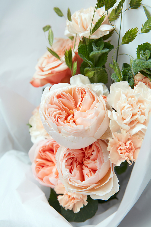 Wedding bouquet with beautiful roses in paper