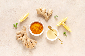 Ginger turmeric tea ingredients, honey, fresh lemon and mint