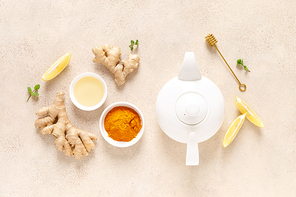 Ginger turmeric tea with honey, fresh lemon and mint