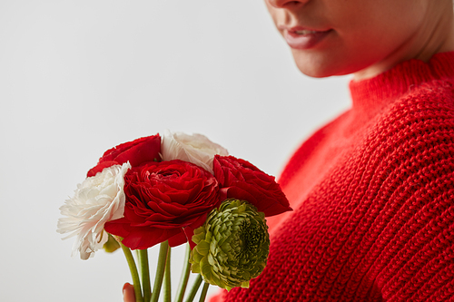 The girl without face with bouquet of flowers on a wtite background with place under text.