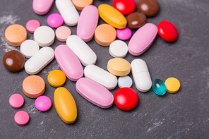 different tablets pills capsule heap mix therapy drugs