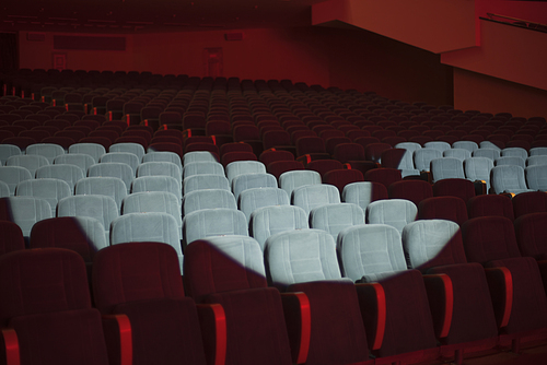 empty auditorium with seats before the start of the performance