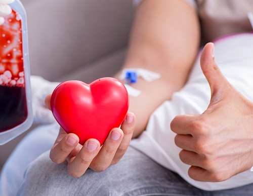 The patient getting blood transfusion in hospital clinic