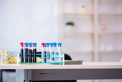 The young lab assistant testing blood samples in hospital