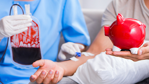 The patient getting blood transfusion in hospital clinic