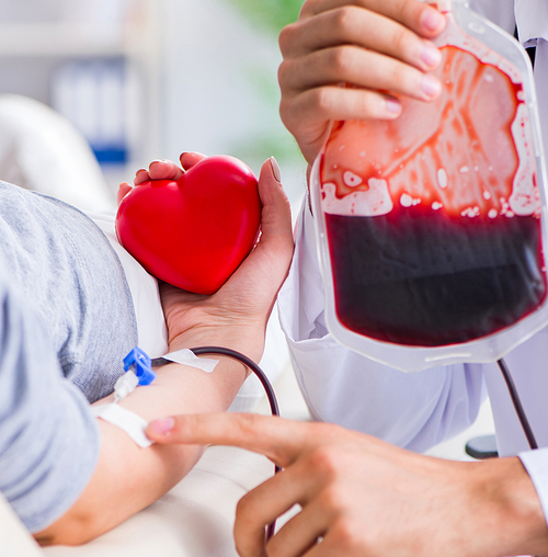 The patient getting blood transfusion in hospital clinic