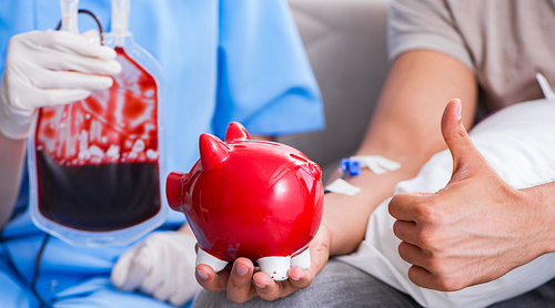 Patient getting blood transfusion in hospital clinic