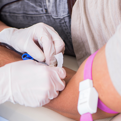 The patient getting blood transfusion in hospital clinic