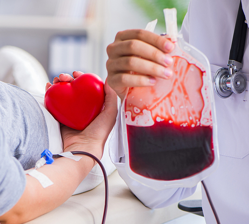 The patient getting blood transfusion in hospital clinic