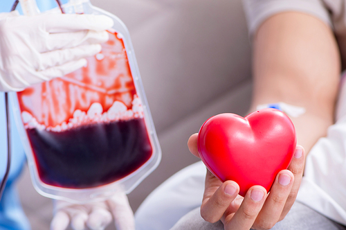 The patient getting blood transfusion in hospital clinic