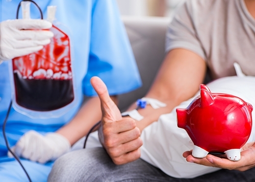 Patient getting blood transfusion in hospital clinic