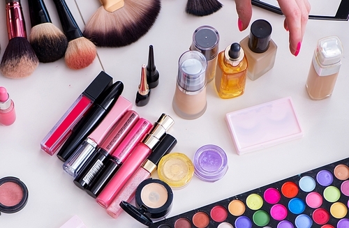The collection of make up products displayed on the table