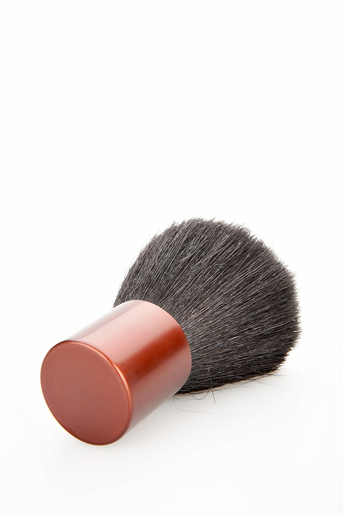 Cosmetic brush for drawing of powder and the blush, isolated