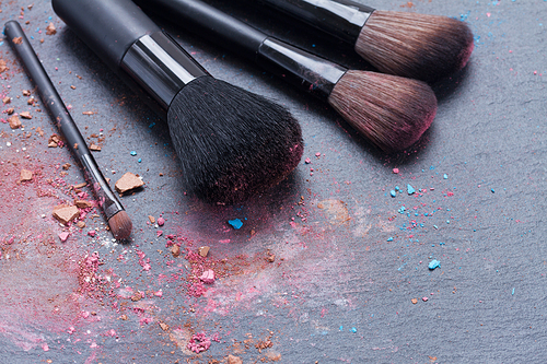 set of  make up brushes on black background